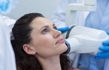 Woman Receving Digital Dental X-Rays